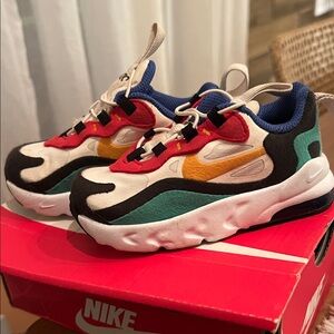 Nike Kids Sneakers in Red, Blue, Green, and Orange